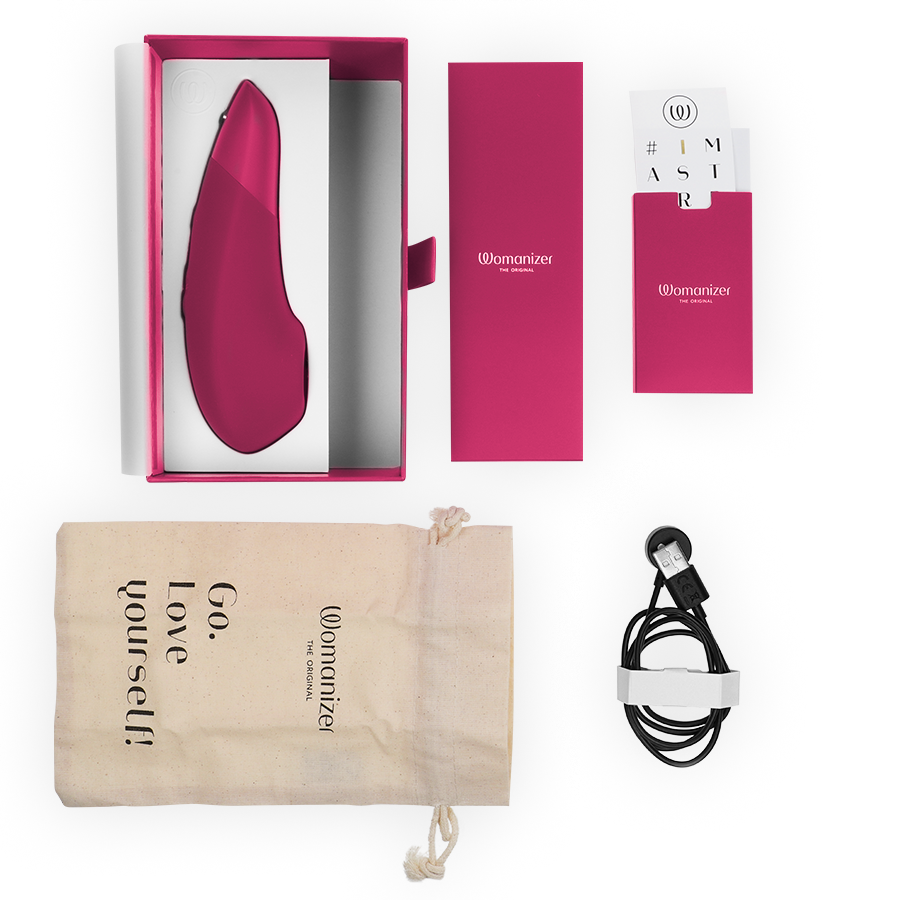 WOMANIZER - STIMOLATORE CLITORIDEO ROSA VIBRANTE